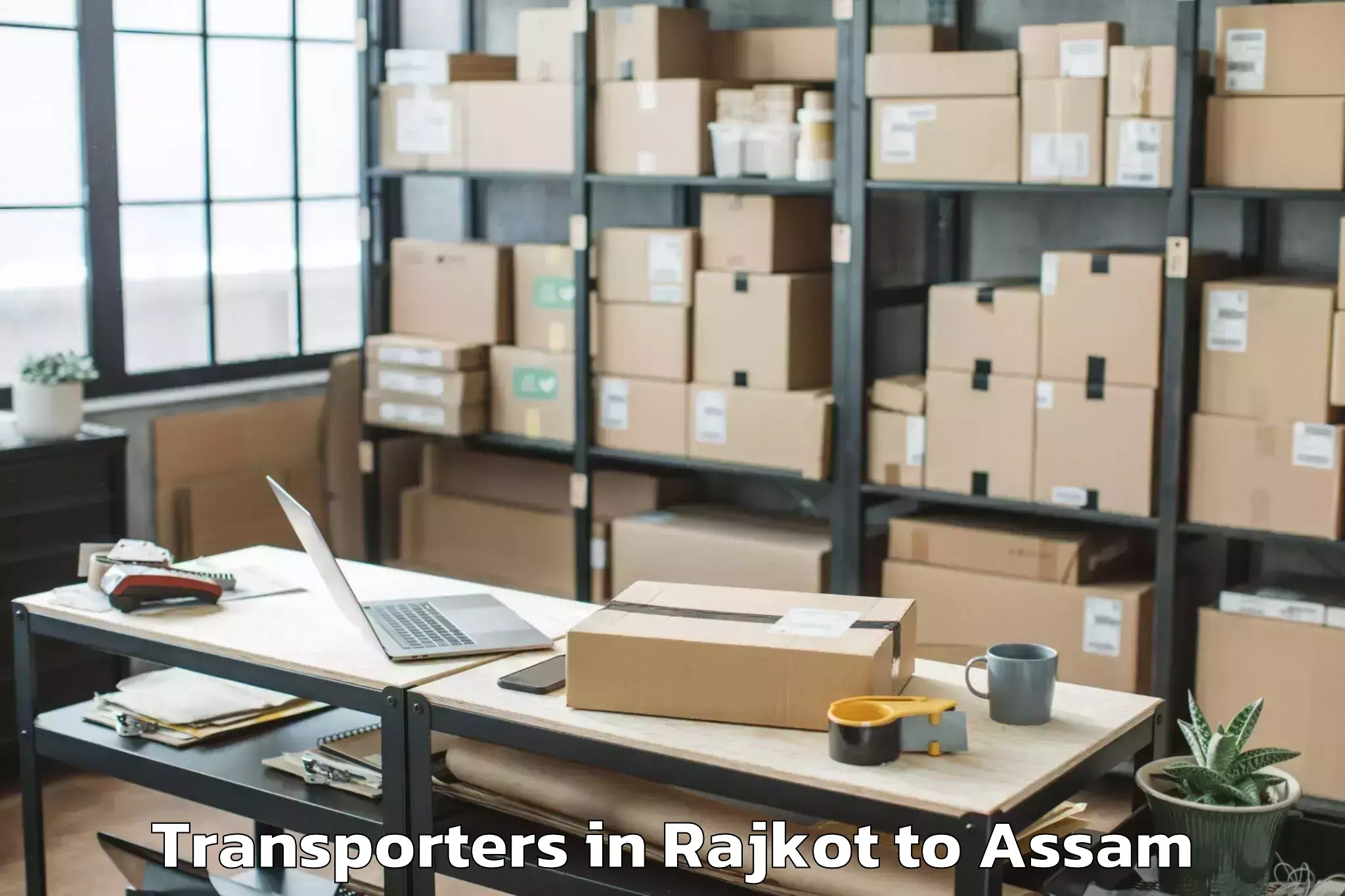 Top Rajkot to Sonapur Transporters Available